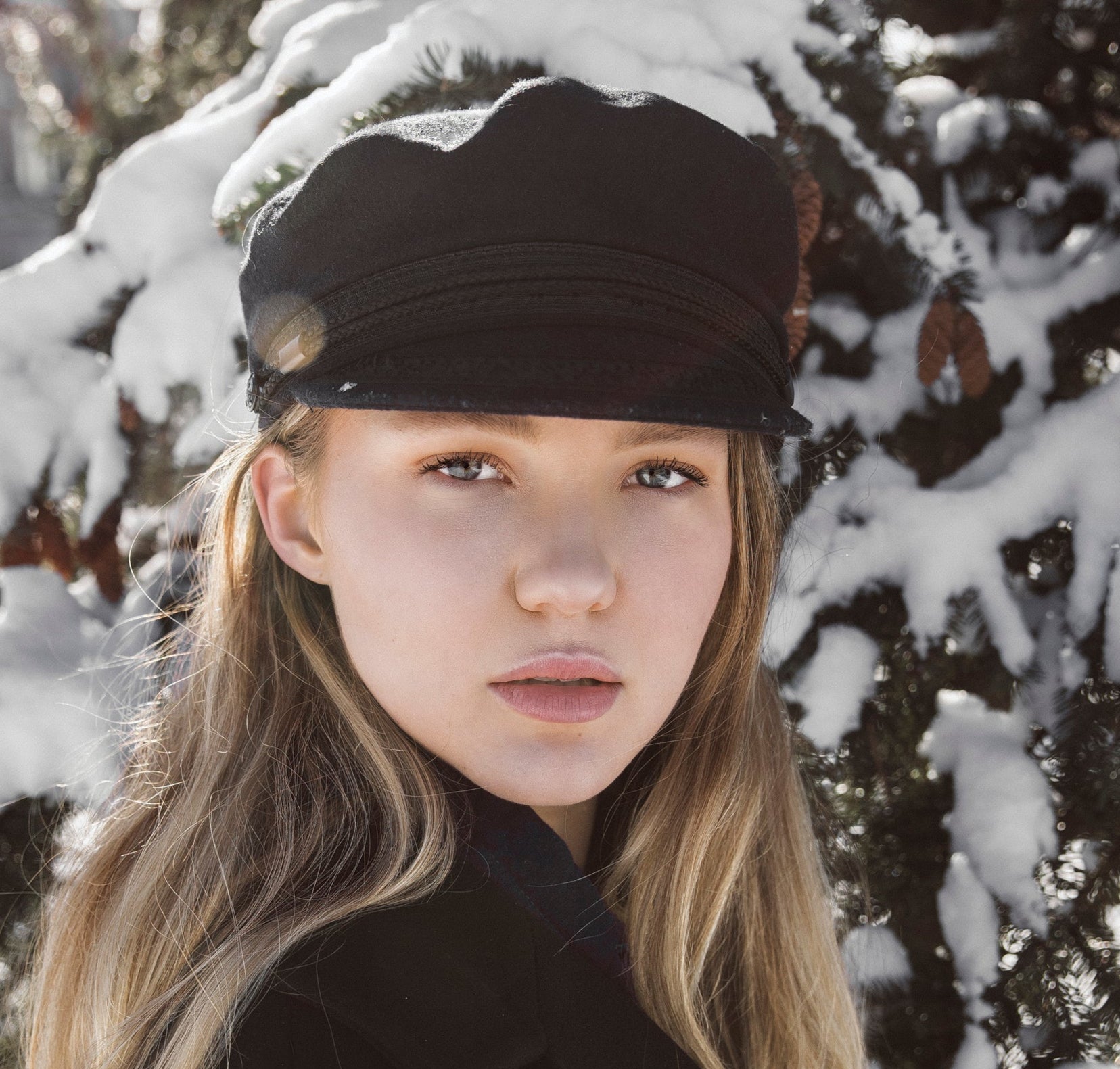 files/blond-woman-with-winter-pine.jpg